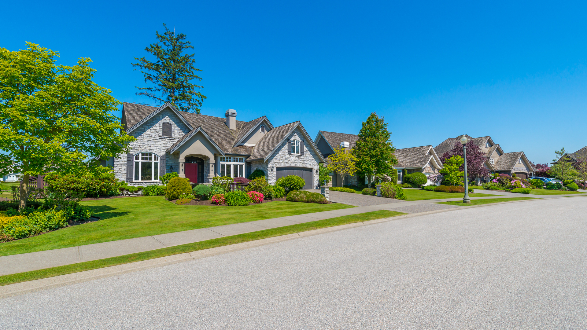 A neighborhood in Red Hill, PA with healthy plenty of healthy grass and landscaping.